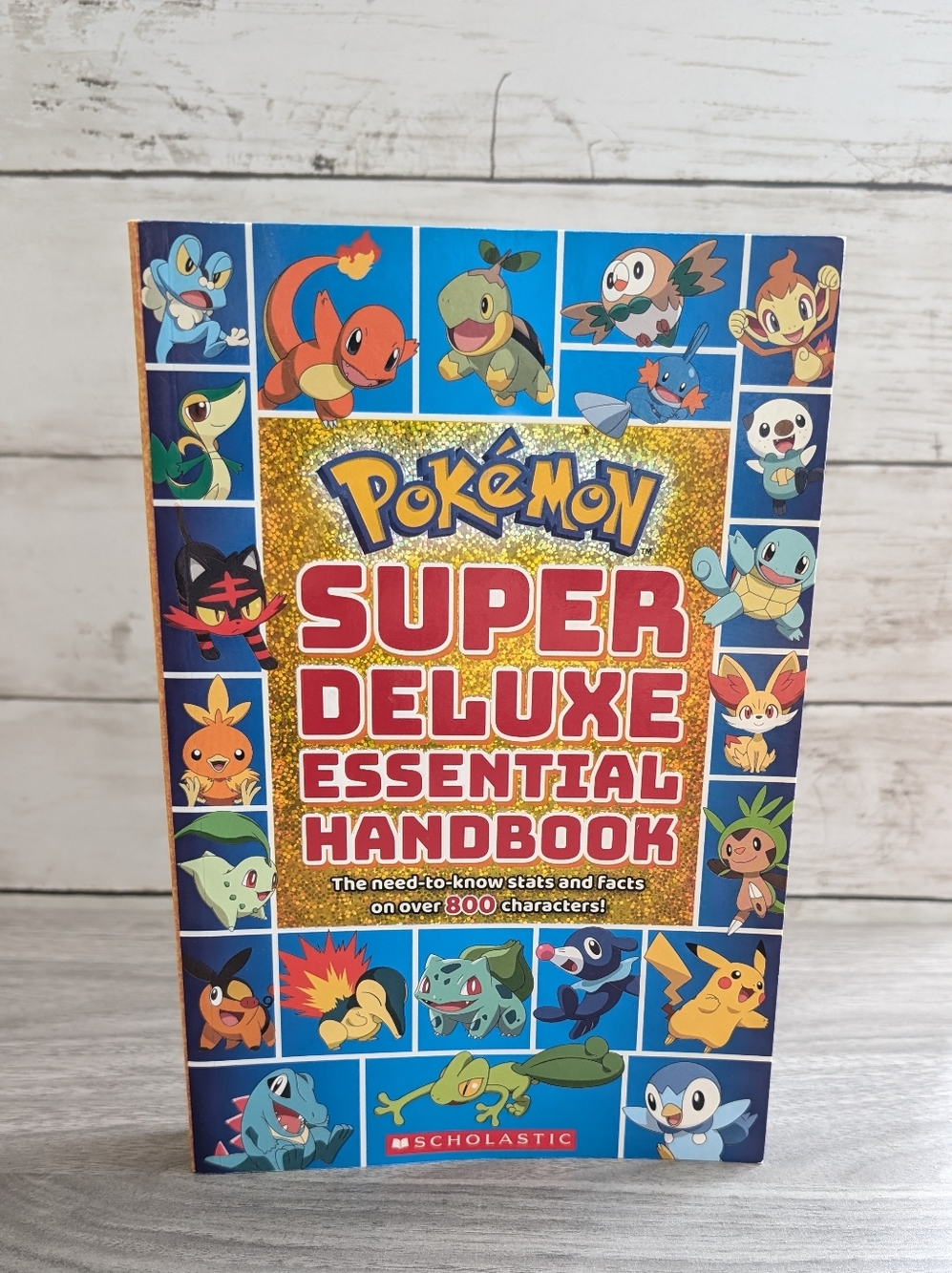 Pokemon Super Deluxe Essential Handbook - Blue and Gold